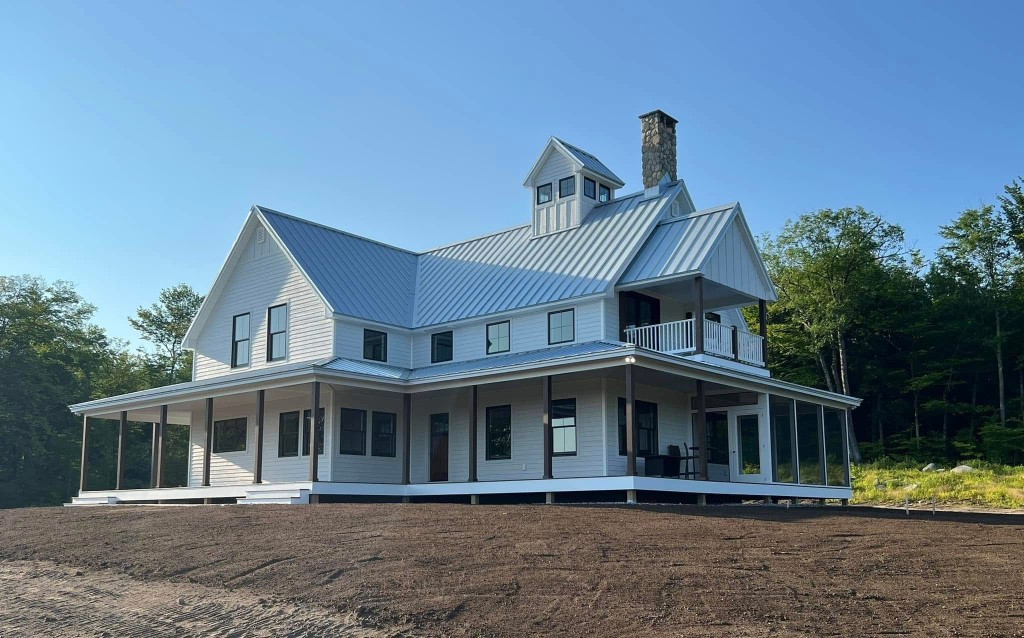 White modern farmhouse custom build by Hilltop Builders